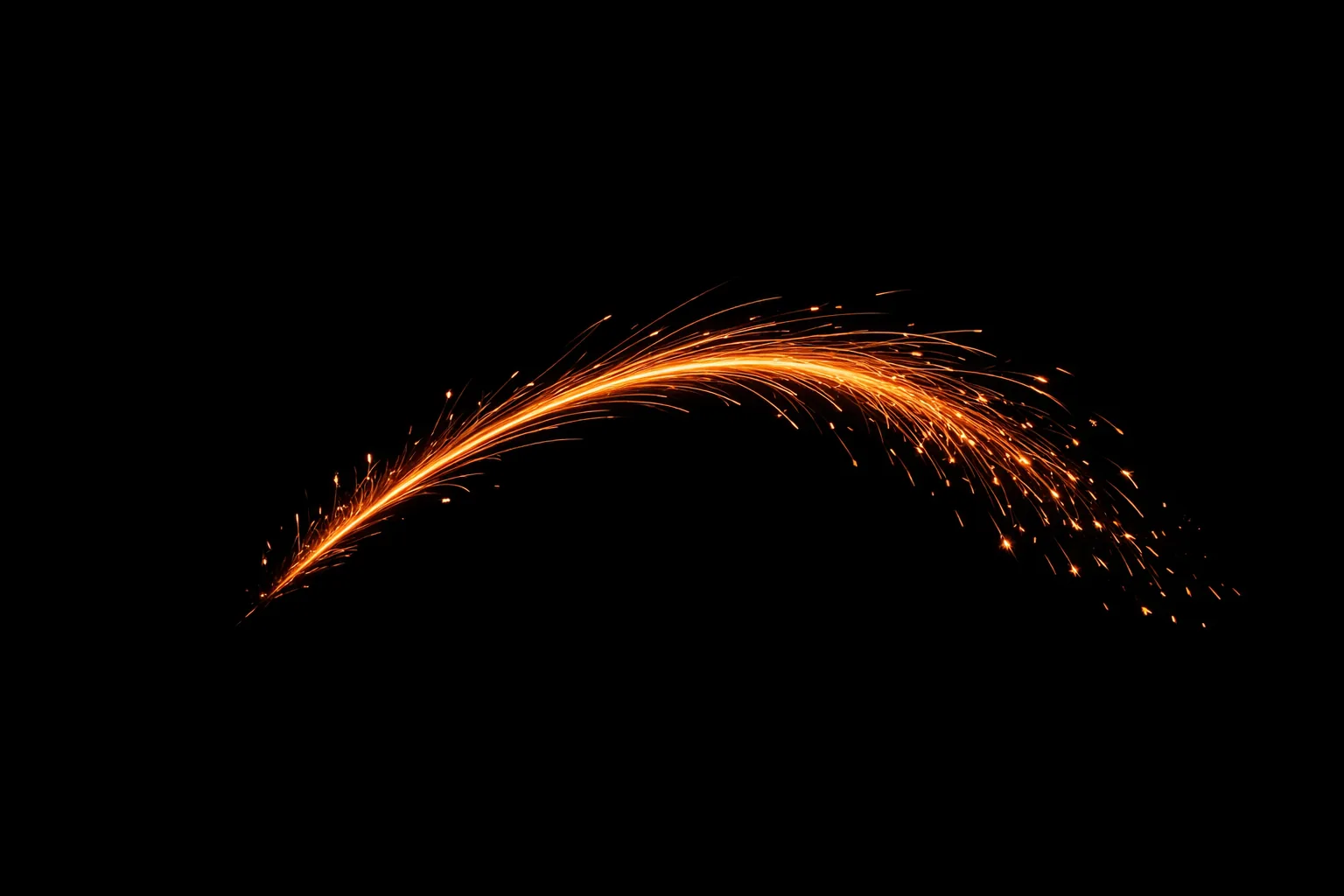 Arc of orange sparks over black